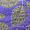 Broccato jacquard viola scuro per abito